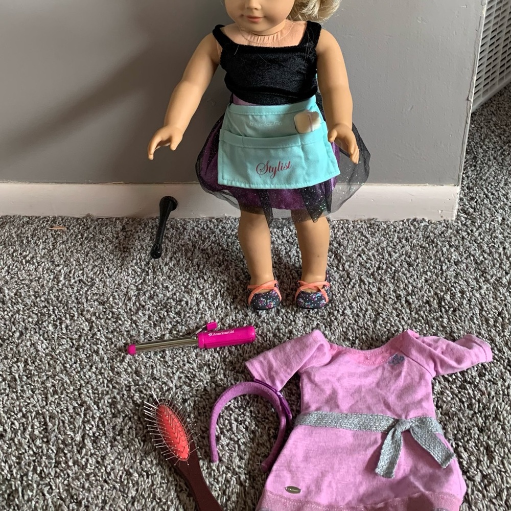 American Girl doll with two outfits and accessories